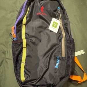 Cotopaxi Black and Purple Backpack with Durable Design